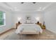 Main bedroom features a vaulted ceiling and light wood floors at 18238 Youngblood N Rd, Charlotte, NC 28278