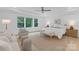 Main bedroom features a vaulted ceiling and light wood floors at 18238 Youngblood N Rd, Charlotte, NC 28278
