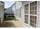 Well-maintained backyard with a black patio set, grill, and green grass at 19834 Davidson Concord Rd, Davidson, NC 28036