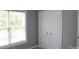 Comfortable bedroom featuring fresh paint, closet, a window and carpet flooring at 19834 Davidson Concord Rd, Davidson, NC 28036