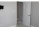 Neutral bedroom with an open door to a closet, carpet, and outlets at 19834 Davidson Concord Rd, Davidson, NC 28036