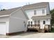Backyard with deck and a detached two-car garage and patio at 19834 Davidson Concord Rd, Davidson, NC 28036