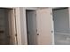 Hallway showing multiple doorways and carpet flooring at 19834 Davidson Concord Rd, Davidson, NC 28036