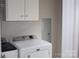 Bright laundry room featuring a Maytag washer and dryer set at 19834 Davidson Concord Rd, Davidson, NC 28036