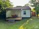 Charming backyard featuring a wooden deck with seating, perfect for outdoor entertaining and relaxation at 199 Crowell Sw Dr, Concord, NC 28025