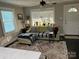 Inviting living room with natural light, stylish rug, comfortable seating, and an open doorway at 199 Crowell Sw Dr, Concord, NC 28025