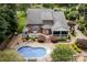 Resort style living with this backyard offering a gazebo, screened in porch and sparkling blue in-ground pool at 2031 Brook View Ct, Matthews, NC 28104