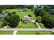Stunning aerial view of the property, showcasing the expansive lot, pool, and meticulously landscaped grounds at 205 Harwell Rd, Mooresville, NC 28117