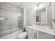 Beautifully renovated bathroom featuring a glass shower, updated vanity, and modern fixtures at 205 Harwell Rd, Mooresville, NC 28117