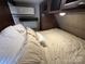 Comfortable bedroom offers a cozy atmosphere with soft pillows, plush bedding, and climate control at 217 Badin View Dr # B257, New London, NC 28127