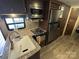 Modern kitchen featuring stainless steel appliances, ample cabinet space, and countertops at 217 Badin View Dr # B257, New London, NC 28127
