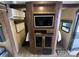 Inviting entertainment area with a TV and stylish cabinets, perfect for relaxation and entertainment at 217 Badin View Dr # B257, New London, NC 28127