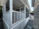 This property features a cozy screened porch with white railings and gravel landscaping at 217 Badin View Dr # B257, New London, NC 28127