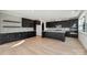 Spacious kitchen with dark cabinetry, stainless steel appliances, and modern finishes at 220 Windy Dell Dr, Tega Cay, SC 29708