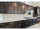 This kitchen boasts modern cabinetry, stainless steel appliances, and sleek countertops at 220 Windy Dell Dr, Tega Cay, SC 29708
