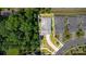 Aerial view of the property showcasing the home, patio area, and manicured lawn at 2245 Lincolnshire Ln, Waxhaw, NC 28173