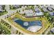 Aerial view of the community with a pond, tennis court, and swimming pool at 2245 Lincolnshire Ln, Waxhaw, NC 28173