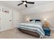 Bedroom featuring cool toned striped bedding, a ceiling fan and a basketball hoop at 2245 Lincolnshire Ln, Waxhaw, NC 28173