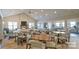 Large clubhouse featuring a fireplace, kitchen, and tables with chairs at 2245 Lincolnshire Ln, Waxhaw, NC 28173