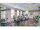 Fitness center with treadmills, exercise bikes and large windows for ample sunlight at 2245 Lincolnshire Ln, Waxhaw, NC 28173