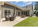 Outdoor patio area with comfortable seating, a dining table, and an outdoor grill at 2245 Lincolnshire Ln, Waxhaw, NC 28173