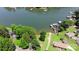Aerial view of a lake house community featuring lake access, docks, and greenery at 252 Chuckwood Rd, Mooresville, NC 28117