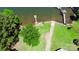 Breathtaking aerial view of the lake with multiple docks and luscious mature trees for ultimate privacy at 252 Chuckwood Rd, Mooresville, NC 28117