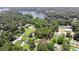 An aerial view showcasing the community nestled among lush greenery and a serene lake at 252 Chuckwood Rd, Mooresville, NC 28117