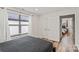 Bedroom with neutral walls, wood-look floors and double door closet at 2813 Ava Ave, Charlotte, NC 28208