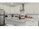 Bright modern kitchen with granite countertops, stainless steel appliances, and stylish accents at 2813 Ava Ave, Charlotte, NC 28208