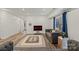 Inviting living area featuring comfortable seating, modern decor, and an open layout at 2813 Ava Ave, Charlotte, NC 28208