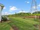 Lush backyard landscaping with a patio and ample green space at 301 Supernova Dr, York, SC 29745