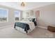 Cozy bedroom featuring a large window and stylish decor at 301 Supernova Dr, York, SC 29745