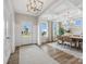 Bright foyer with a coffered ceiling, hardwood floors, and an adjacent dining area at 301 Supernova Dr, York, SC 29745