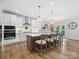 A modern kitchen with an island, stainless steel appliances, and pendant lighting at 301 Supernova Dr, York, SC 29745