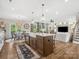 A modern kitchen featuring an island, stainless steel appliances, and an open layout at 301 Supernova Dr, York, SC 29745