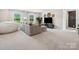 Large living room with neutral decor and plenty of seating at 301 Supernova Dr, York, SC 29745