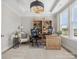 Well-lit home office featuring built-in shelving, tray ceiling and a comfortable workspace at 301 Supernova Dr, York, SC 29745