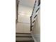 Elegant staircase featuring wood and white trim plus wainscoting on the wall at 301 Supernova Dr, York, SC 29745