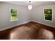 Light and bright bedroom with hardwood floors and lots of natural light at 3109 Morson St, Charlotte, NC 28208