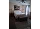 Comfortable bedroom with dark wood floors, bedside tables, and ample natural light at 315 S Grandview Rd, Clover, SC 29710