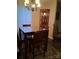 Dining area with a modern chandelier and a glass-topped table at 315 S Grandview Rd, Clover, SC 29710