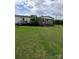 Modest home with large lawn, wooden decks and a screened in porch in a peaceful, private setting at 315 S Grandview Rd, Clover, SC 29710