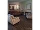 Inviting living room with comfortable seating, wood flooring, and a large mirror at 315 S Grandview Rd, Clover, SC 29710