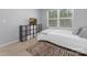 Charming bedroom with a comfortable bed, storage unit and a bright, airy atmosphere at 3230 Yarmouth Ln, Gastonia, NC 28056