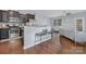 Open-concept kitchen with stainless appliances, granite countertops, a breakfast bar, and seating for two at 3230 Yarmouth Ln, Gastonia, NC 28056
