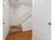 Entryway with stairs and a white door at 3313 Fortis Ln, Matthews, NC 28105