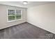 Bedroom with neutral paint and carpet and bright window with neighborhood view at 3486 Duchess Ave, Fort Mill, SC 29707