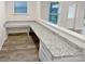 Office area with built-in desk and drawers and a window for natural light at 3486 Duchess Ave, Fort Mill, SC 29707