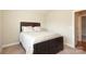 Bedroom with bed, carpet, and a door that is open to the rest of the house at 3523 Brickwood Cir, Midland, NC 28107